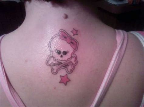 Skull And Crossbones With Pink Bow Tattoo