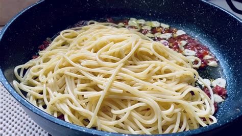 Spaghetti aglio e olio is a traditional italian recipe that simply means spaghetti with garlic and olive oil. FULL VIDEO Aglio e Olio Spaghetti Recipe - YouTube