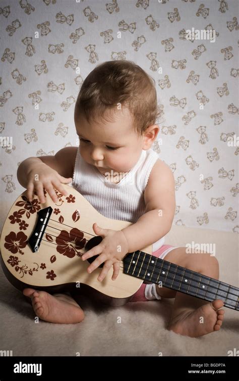 Baby With Guitar Stock Photo Alamy