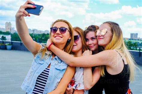 Friends Taking Selfie With Smartphone Stock Photo