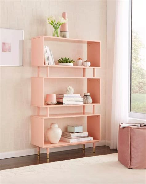 A Pink Bookcase For Your Books Magazines And Journals With Three