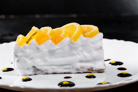Maybe you would like to learn more about one of these? Ein Stück Kuchen mit Limonenquark, weißer Sahne ...