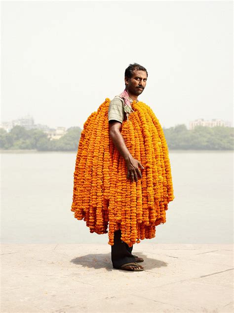 Gourd(vine, flowers & fruit) support, prosperity: Flower Man: The Men Who Sell Flowers in India