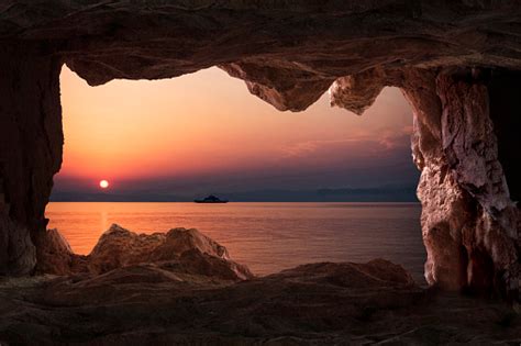 View Of The Sunset From The Cave Inside In Thasos Greece Stock Photo