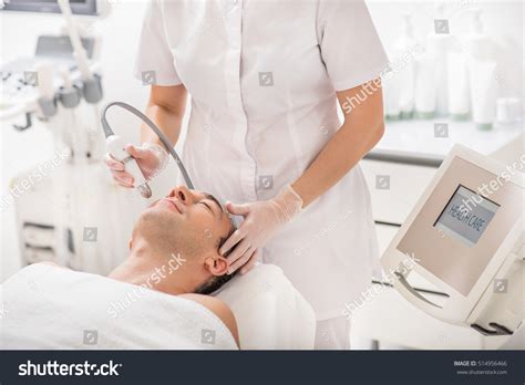 Skillful Beautician Treating Male Face By Stock Photo 514956466