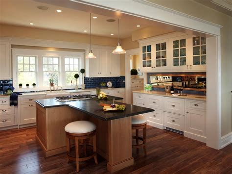 An Unusual T Shaped Kitchen Island Which Allows Those Perched On The