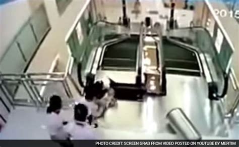 Chinese Woman Dies After Falling Into Escalator But Saves Son