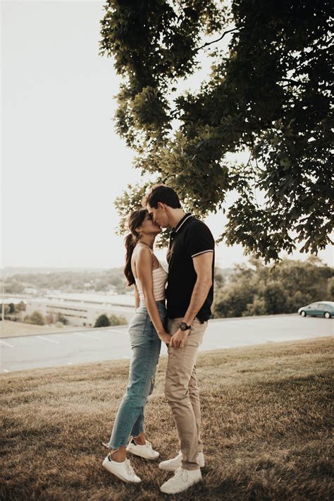 Cute And Warm Couple Session Romantic Engagement Session In Field Casual Outfits For Engageme