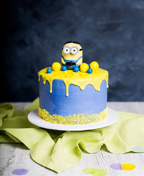 Place the cake in the refrigerator to cool as. Minion Drip Cake - keep the kids entertained with a ...