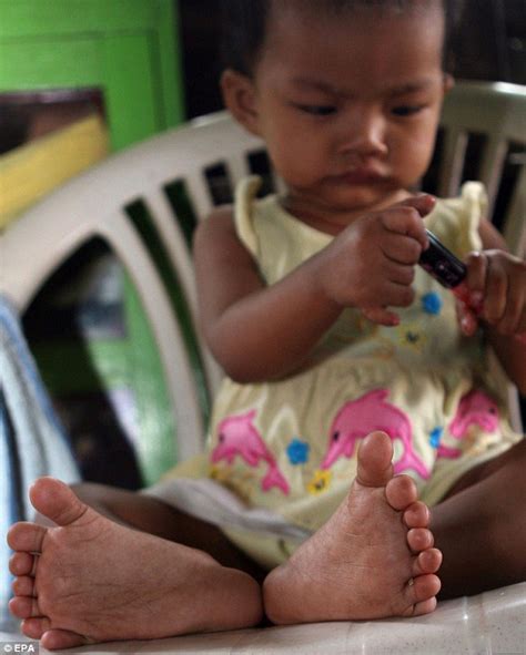 guinness world record one year old girl with 12 fingers and 14 toes daily mail online
