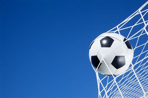 Soccer Ball On The Goal Net Stock Photo Download Image Now Istock