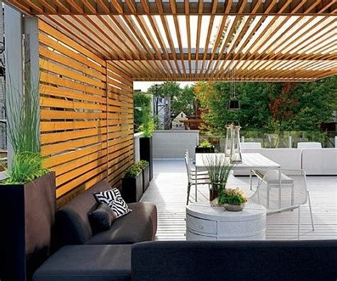 In this bathroom petrol blue tiles have been paired with bright yellow rugs for a surprisingly graphic look. Build pergola itself - Garden Design Ideas | Interior Design Ideas | AVSO.ORG