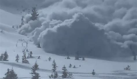 Video Shows Terrifying View Of Avalanche Barreling Down On Snowmobilers