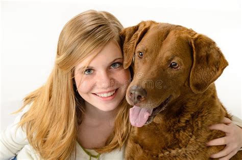 Cute Young Girl Holding A Dog Royalty Free Stock Photos Image 31025368