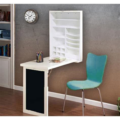 This art desk has an adjustable angle for comfort and it folds down when not used to occupy as little space as possible. Utopia Alley Fold-Down White Floating Hanging Desk with ...