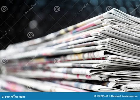 Newspapers Folded And Stacked On The Table Modern Dark Background