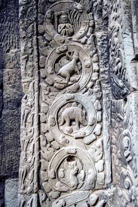 Stegosaurus Bas Relief On The Wall Of Ta Prohm Temple Stock Photo