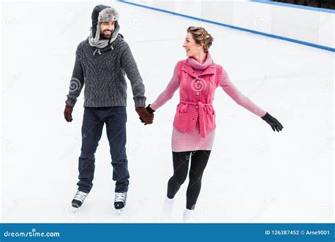 Couple Ice Skating In Winter Stock Photo Image Of Couple Hand 126387452