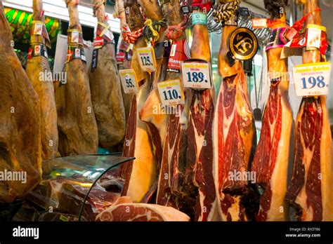 Spanish Jamon Ham Is Hung And Ready For Slicing At A Traditional Market In Barcelona Spain
