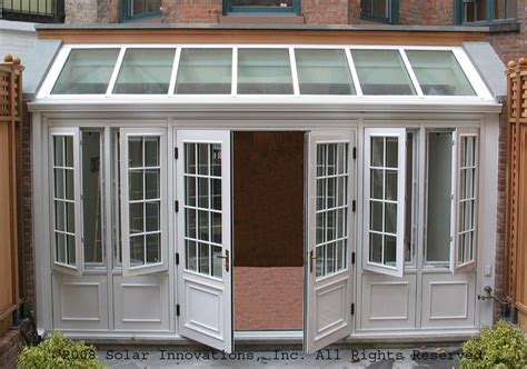 French Sunroom With Recycled Windows With A Complete Window And