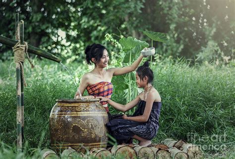 Young Asian Woman Bathing In Tropical Photograph By Sasin Tipchai