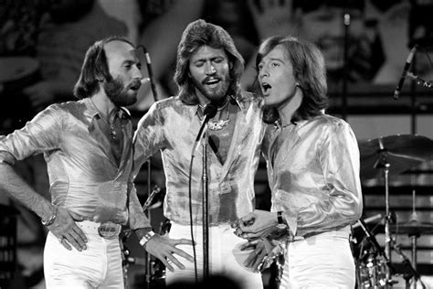 Get exclusive updates from the bee gees. Bee Gees | Michael Putland