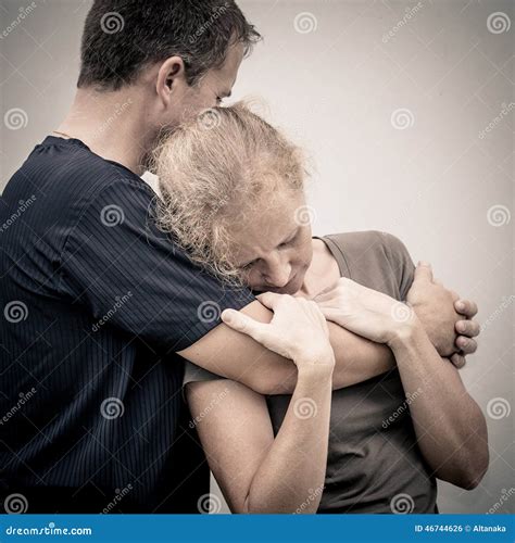 Sad Woman Hugging Her Husband Stock Photo Image Of Emotion Lifestyle