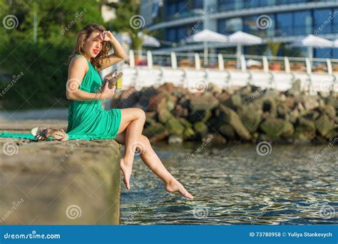 Beautiful Woman Sitting On The Pier Stock Photo Image Of Accessories Legs