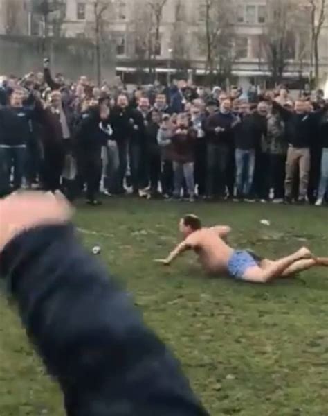 Half Naked Schalke Fan Delights Crowd With Huge Mud Slide As Germans Prepare For Man City
