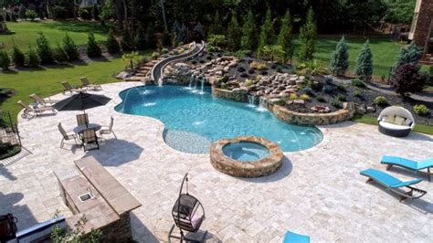 Large Custom Freeform Pool With Slide Grotto Waterfall And