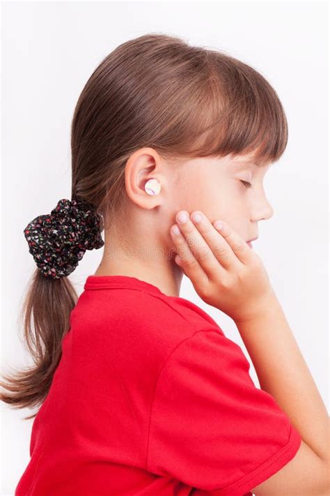 Girl With Ear Plugs In Your Ears Stock Image Image Of Concentrate