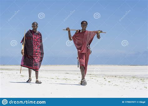 African Men Masai Dressed In Traditional Clothes Standing Near The