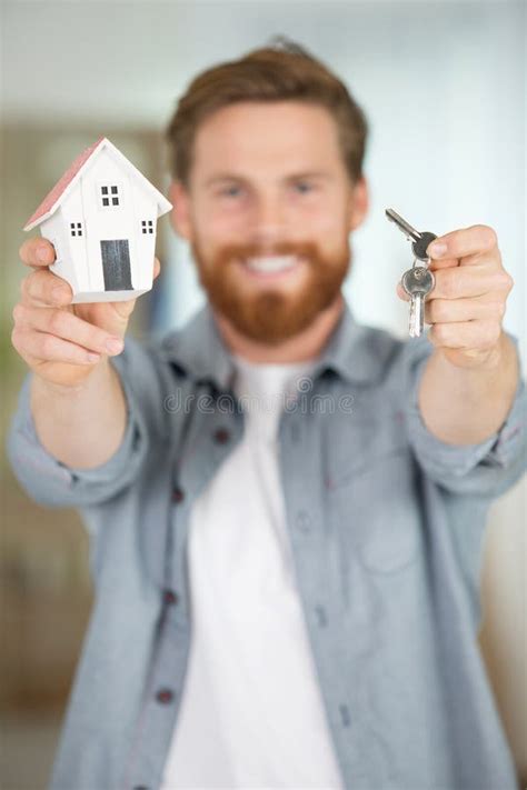 Handsome Man Holding Model House And Keys In Hands Stock Image Image