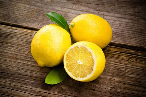 Fresh Organic Fruit Lemons On Wood Stock Image Image Of Root