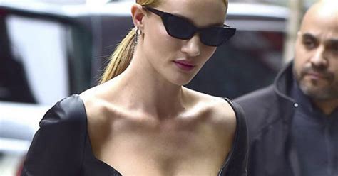rosie huntington whiteley squeezes chest into plunging pvc top for dominatrix sex appeal daily