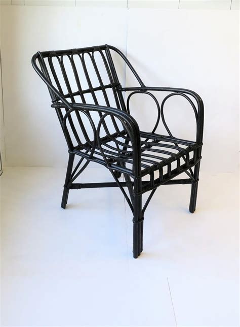 Quality set 6 oak bow back windsor dining chairs. Vintage Black Wicker Rattan Armchair For Sale at 1stdibs