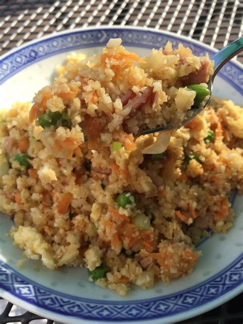 To the pan, add riced cauliflower, cumin, chili powder and garlic salt. Cauliflower Fried Rice - Nancy On The Home Front ...