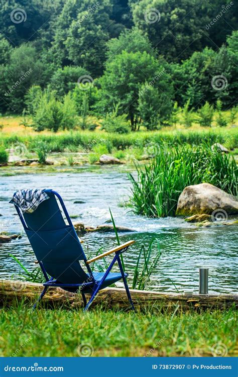 Chair For Camping On The River Bank Stock Image Image Of Clouds