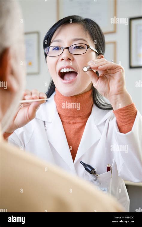 A Doctor Examining A Patient Stock Photo Alamy
