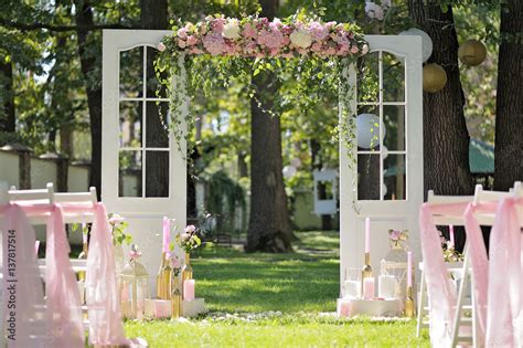Beautiful Wedding Arch Decorated With Roses And Peons Closeup Stock