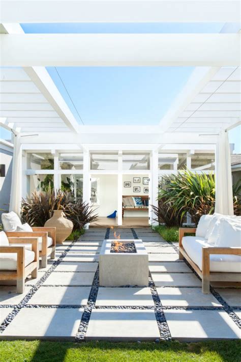 A patio is a paved outdoor area that adjoins a house, and is a popular addition to australian and new zealand homes. 15 Startling Contemporary Patio Designs For Your Backyard