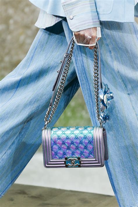 Vinyl was used heavily throughout the collection, from transparent boater hats, to iridescent fringe details, to a wide variety of bags…and i've never wanted something plastic more in my entire life! Chanel Spring Summer 2018 Runway Bag Collection | Bragmybag