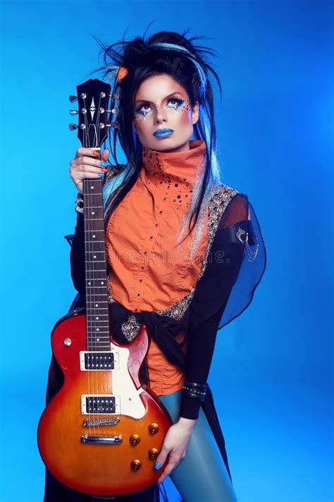 Rock Girl Posing Electric Guitar Blue Backgroun Stock Photos Free