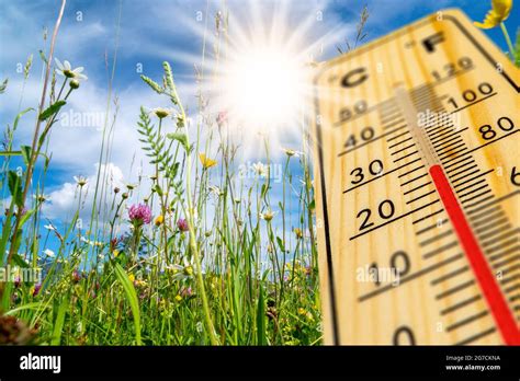 Heat In Summer With High Temperature At Thermometer Stock Photo Alamy