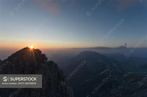 Sunrise Over The Mountains With Sunrays Superstock