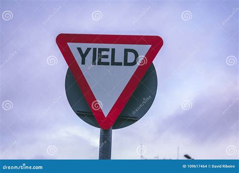 Close Up Of A Yield Road Sign Outside Stock Photo Image Of Driving