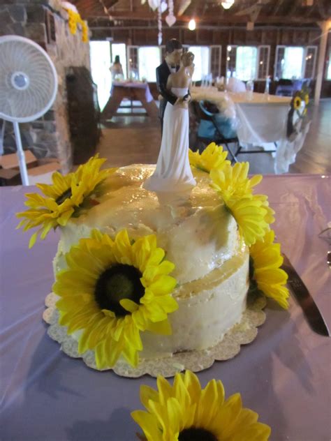 Chris and heather share a passion for excellence in baking. Sunflower Wedding Cake | Sunflower wedding cake, Wedding ...