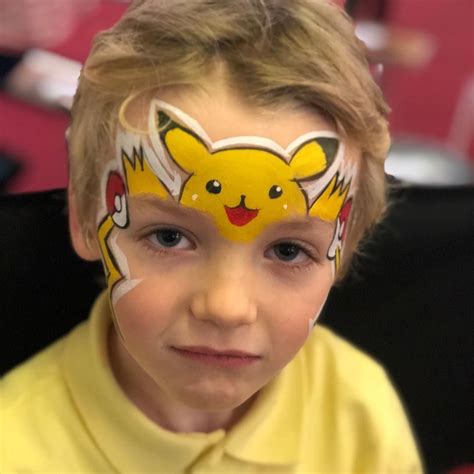 Pikachu By Emerald Face Painting Pikachu Face Painting Face Painting