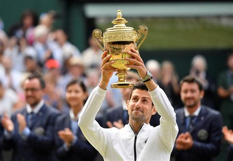 Novak Djokovic Wins Wimbledon Outlasting Roger Federer The New York