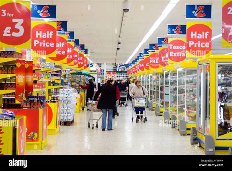 Special Offer Signs In Tesco Extra Supermarket Aisle Uk Stock Photo